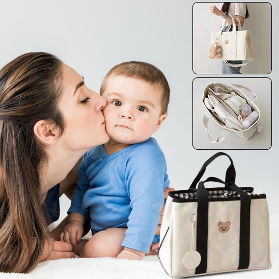 sac à langer multifonctionnel élégant à coté de maman et bébé