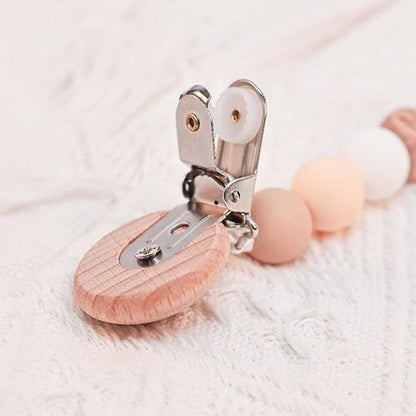 attache tetine en bois fiable avec clip métallique