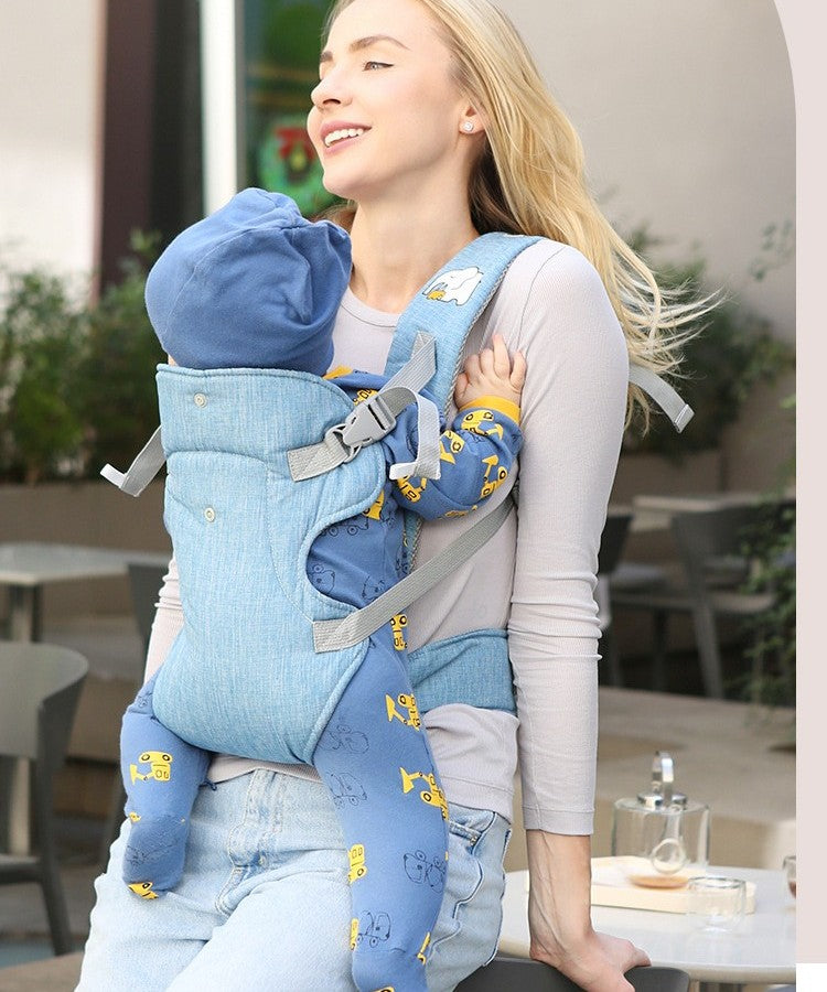 bébé dans porte bébé ergonomique airconfort avec maman au café restaurant