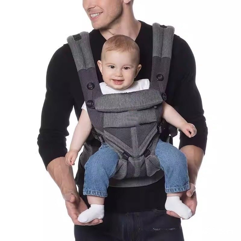 bébé dans porte bebe physio comfort ergonomique avec papa