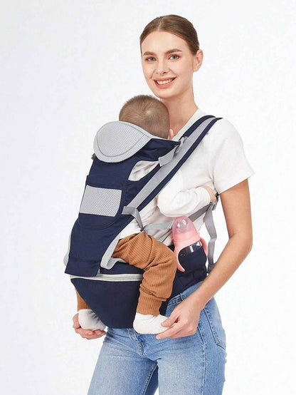 bébé en position ventrale dans porte-bébé physiologique comfortplus