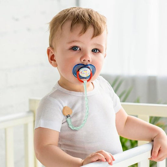 bébé porte attache tetine crochet chou