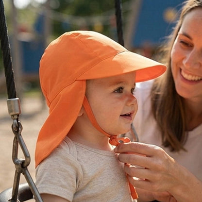 bébé porte casquette pour bébé babysmile avec maman au parc