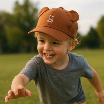 bébé porte casquette pour bébé sunconfort au parc