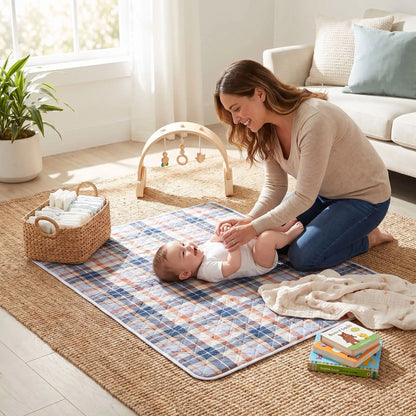 bébé sur tapis à langer nomade journey au salon avec maman