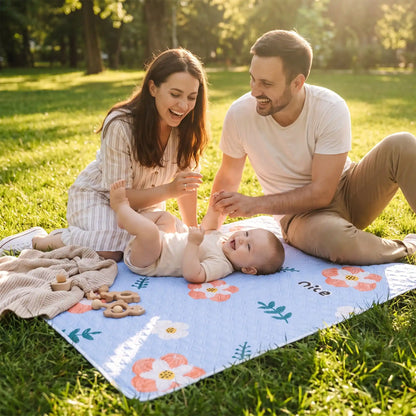 bebe sur tapis pour changer bebe sunflower avec famille
