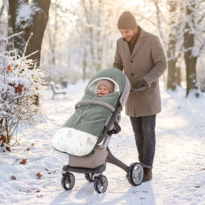 chanceliere cosy hiver velours doux avec bébé au parc avec papa