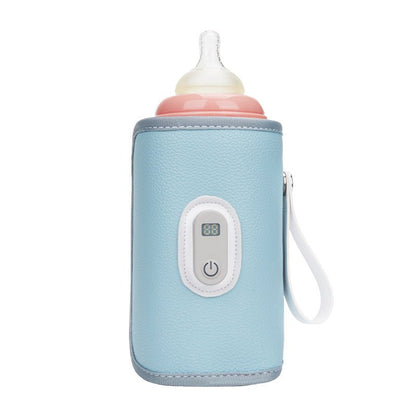 chauffe biberon nomad compact avec biberon