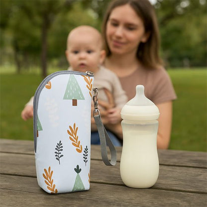 chauffe - biberon portable pratisécur et biberon sur la table à coté de maman et bébé