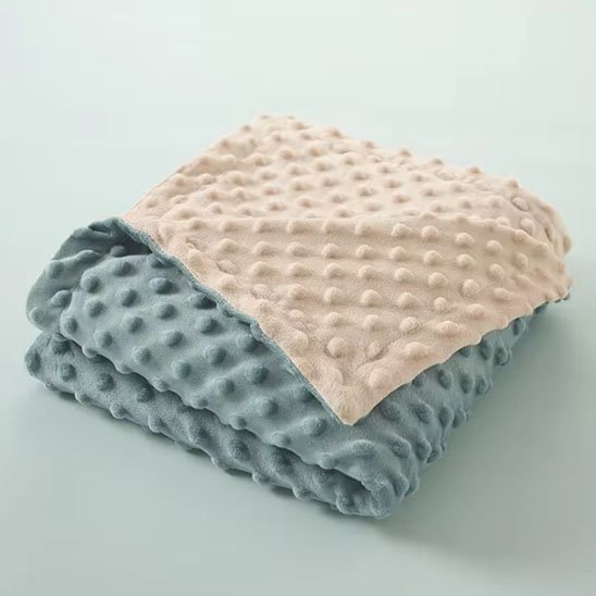 couverture cosy hiver ouaté bleu