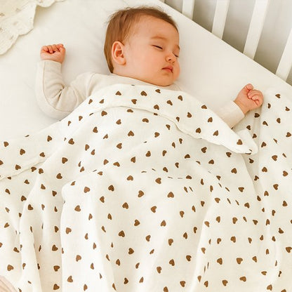 couverture poussette suave sur bébé endormi