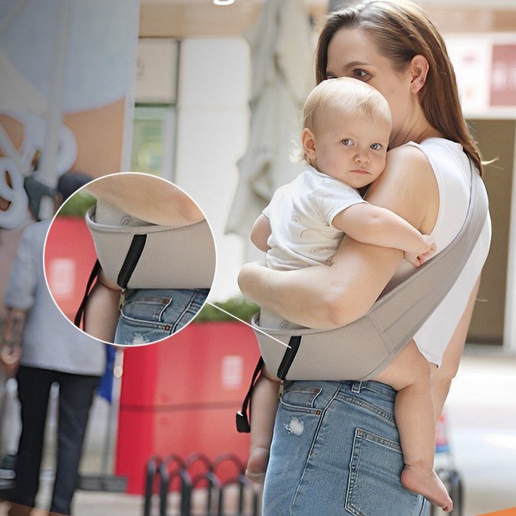maman porte bébé dans une écharpe de portage bébé ergonomique