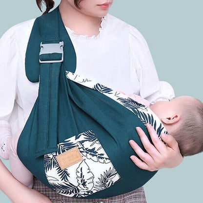 maman porte bébé en echarpe de portage confort sécurisant 