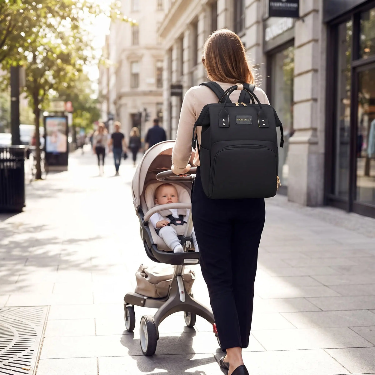 maman porte sac a langer impermeable extra avec bébé