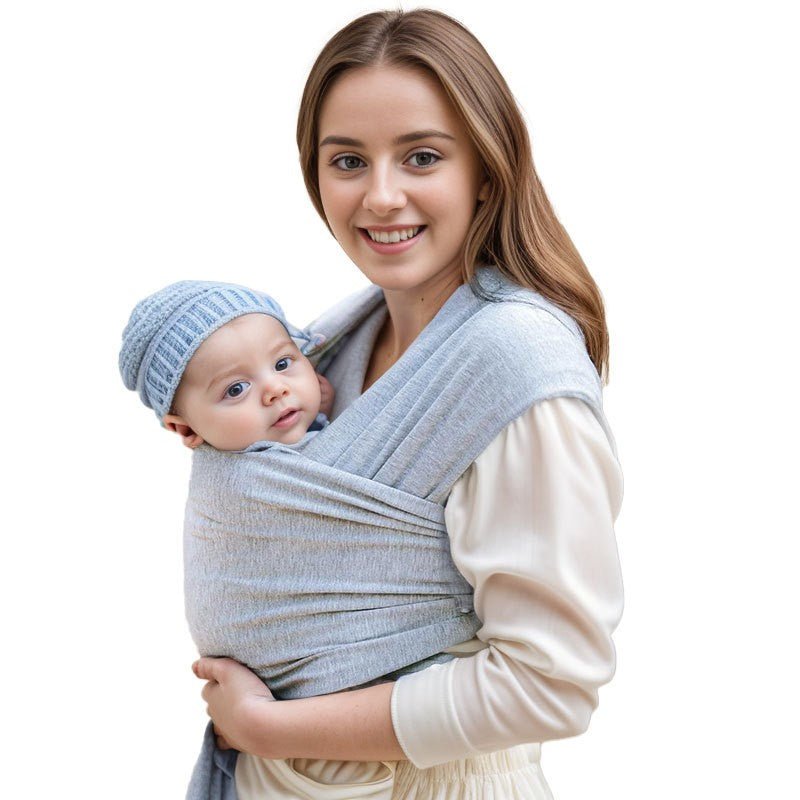 maman souriante à bébé en écharpe de portage bébé coton physiologique