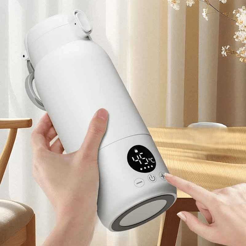 maman tient chauffe lait portable autonome 