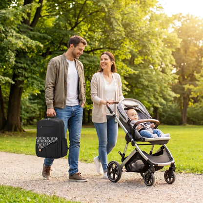 papa porte sac a langer baby chic mommystar au parc avec maman et bébé