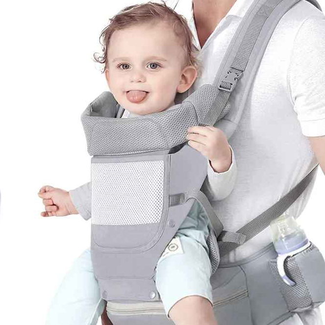 papa avec bébé en porte bébé physiologique respirant
