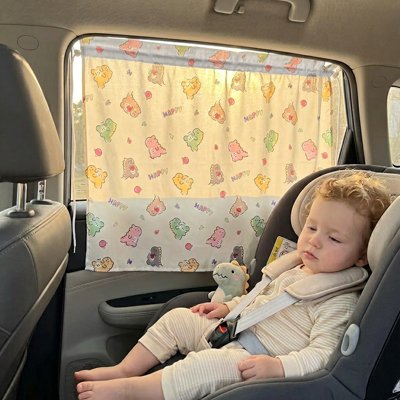 pare soleil pour voiture light sur vitre avec bébé