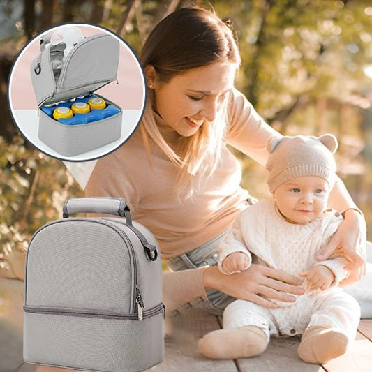 porte biberon pratikMom à coté de maman et bébé sur la table