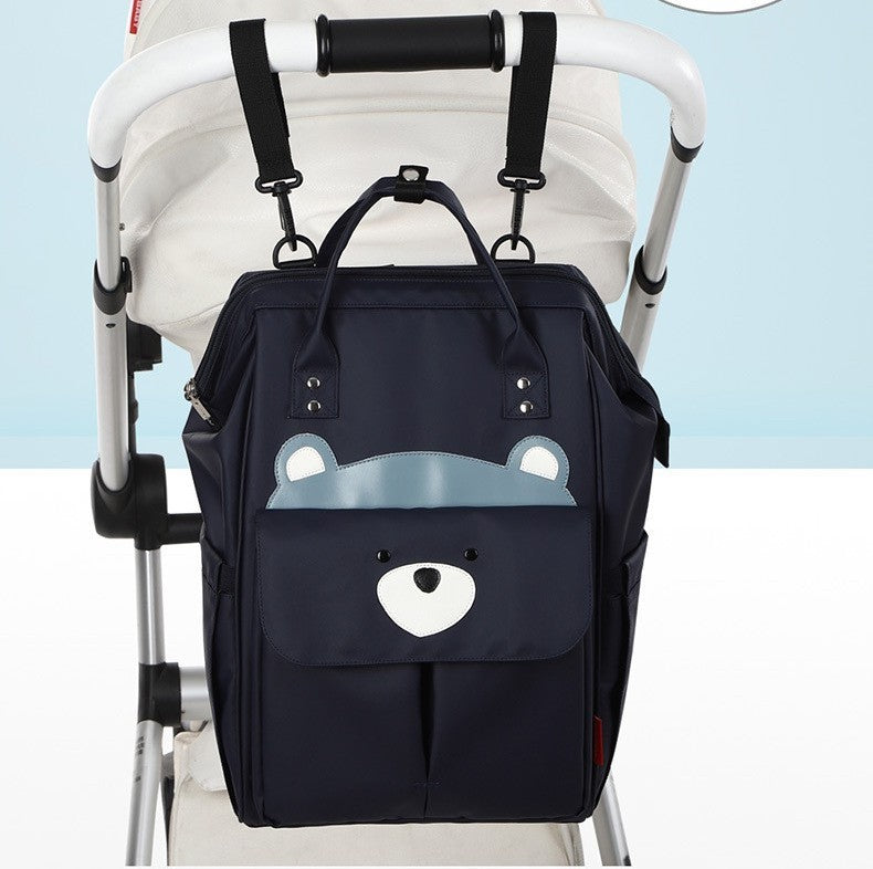 sac a dos a langer chic mombear attaché à la poussette
