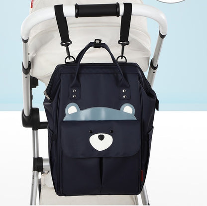 sac a dos a langer chic mombear attaché à la poussette