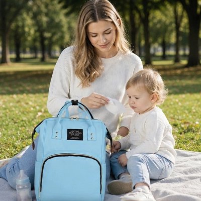 sac à dos à langer imperméable top avec maman et bébé au parc