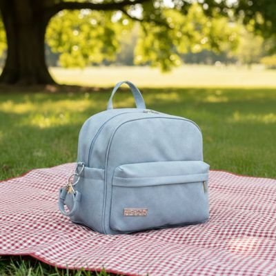 sac a langer a dos précieux sur la couverture 