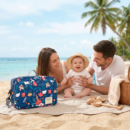 sac a langer bebe chic fleur sur la plage avec bébé et sa famille
