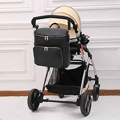 sac a langer chic cuir mompratique attaché à la poussette