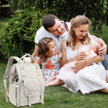 sac à langer momélégance  à coté de bébé et sa famille