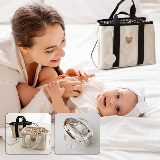 sac à langer multifonctionnel élégant avec bébé et maman sur le lit 