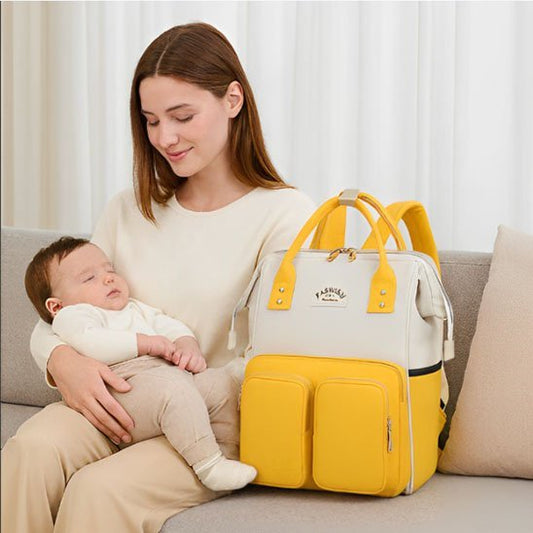  sac à langer organisé & élégant à coté de maman et bébé