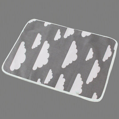 tapis à langer nuages